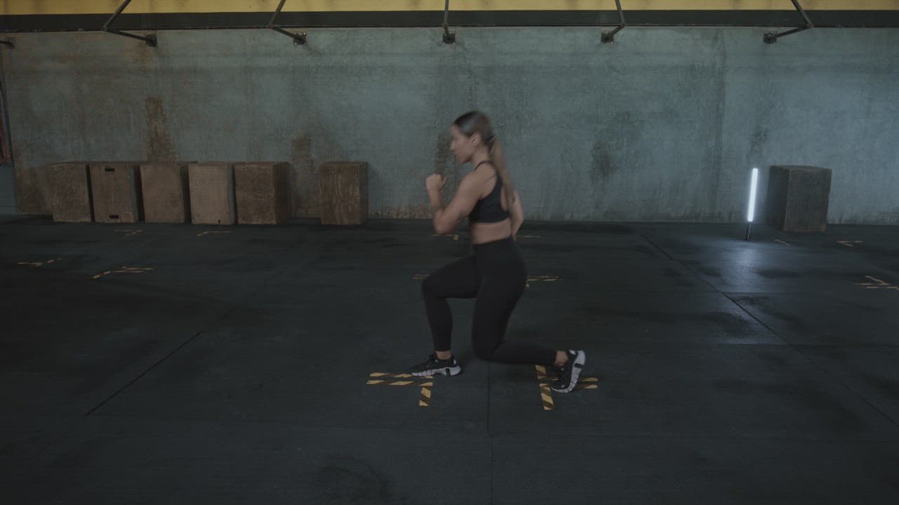 Woman doing walking lunges